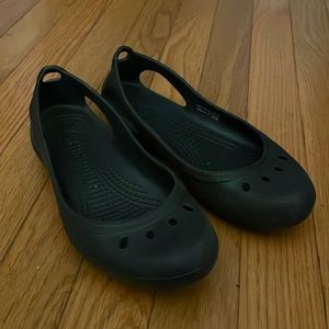 Black CROCS flats